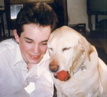 Photo of James and childhood dog